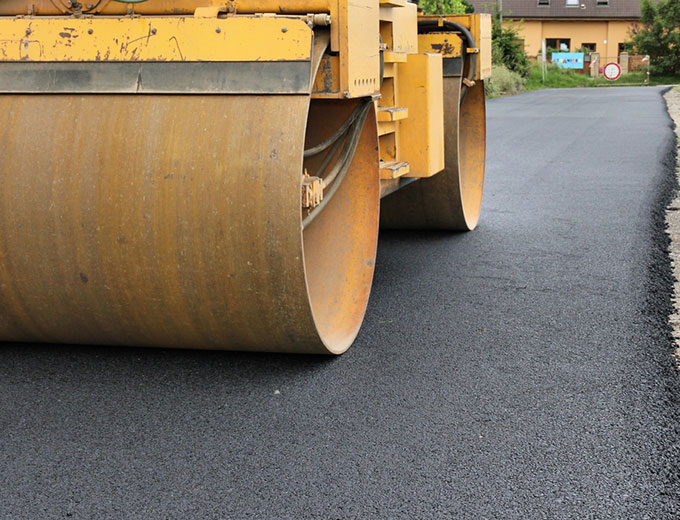 dallas asphalt paving - roller smoothing asphalt
